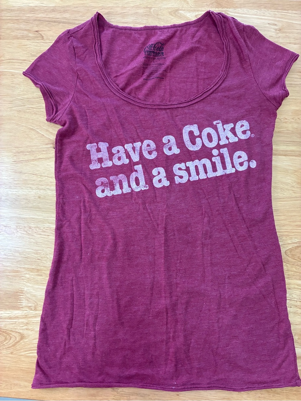 Coca-Cola, vintage large women’s T-shirt, and red, “Have a Coke and a smile.”